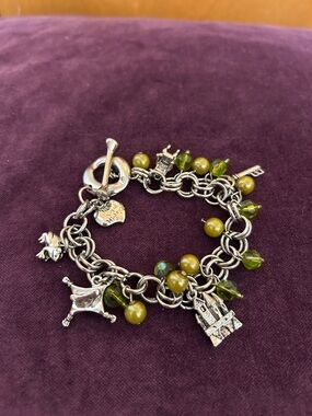 Silver tone princess charm bracelet
